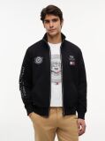 Negru TH x Cadillac Formula 1® Team Jacheta De Trening Cu Imprimeu Me Spate  Unisex